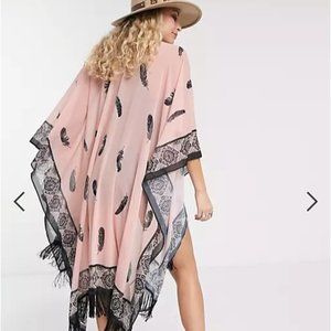 ASOS DESIGN tassel cape / scarf in feather print